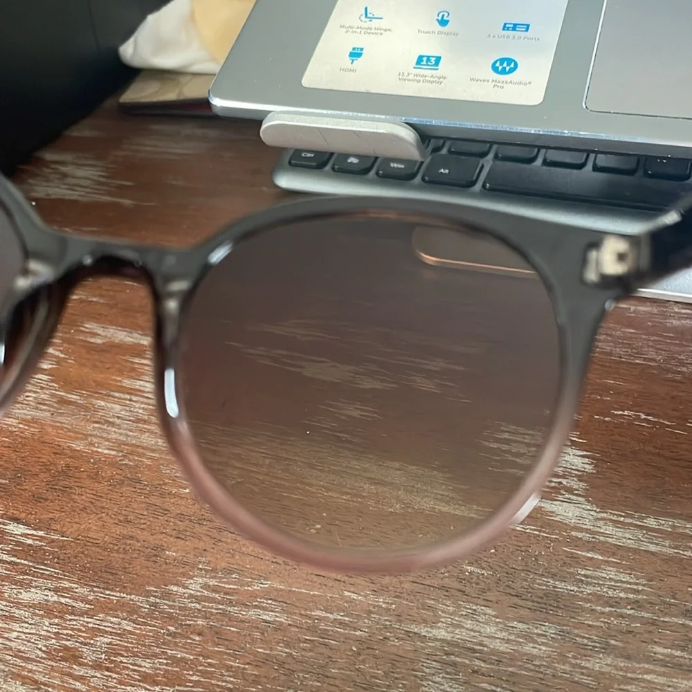 Cocosand pink transparent fade sunglasses.
